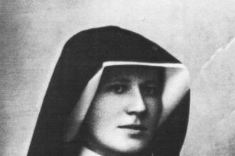 Saint Maria Faustina Kowalska in religious habit and veil, archival photograph taken in 1931
