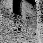 The grand white facade of Casa Sollievo della Sofferenza hospital founded by Padre Pio