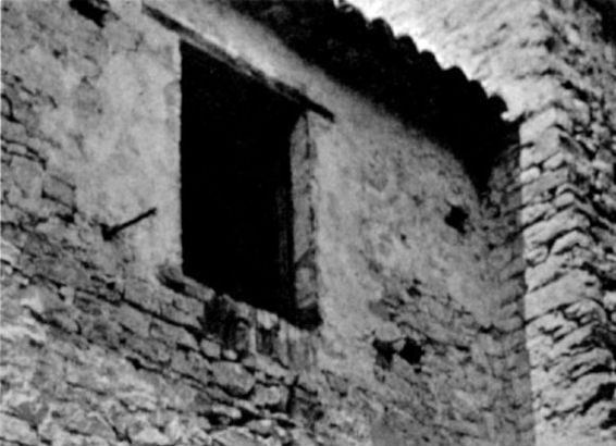 The grand white facade of Casa Sollievo della Sofferenza hospital founded by Padre Pio